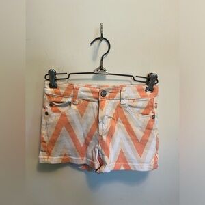 Lulu Luv, girls youth multicolored jean shorts with zig zag design.